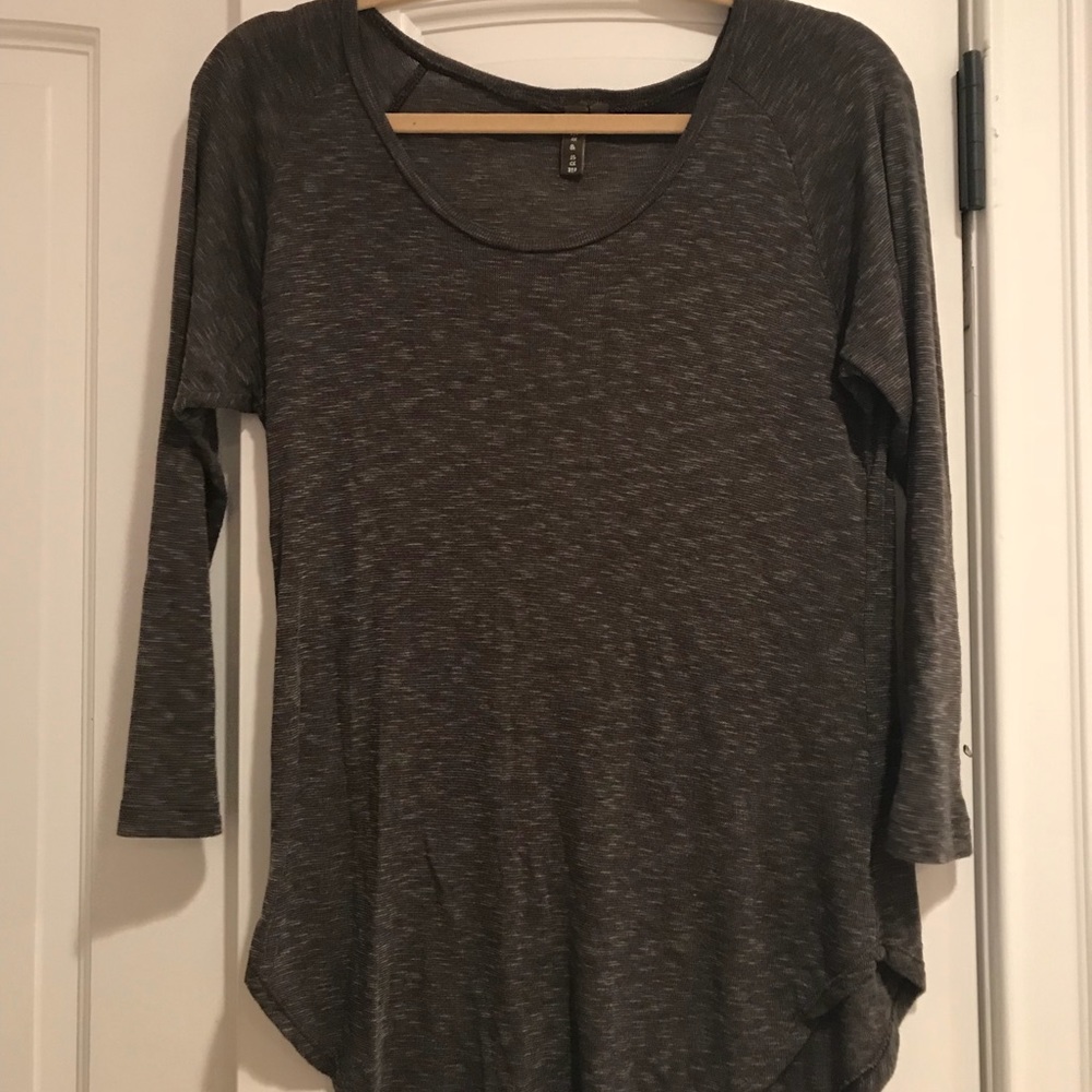 Three quarter sleeve tee, available in two colors